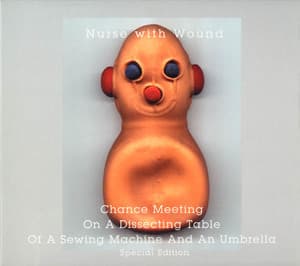 Chance Meeting On A Dissecting Table Of A Sewing Machine And An Umbrella